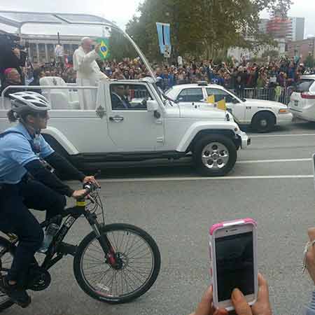 Pope Francis driving by in Philly.